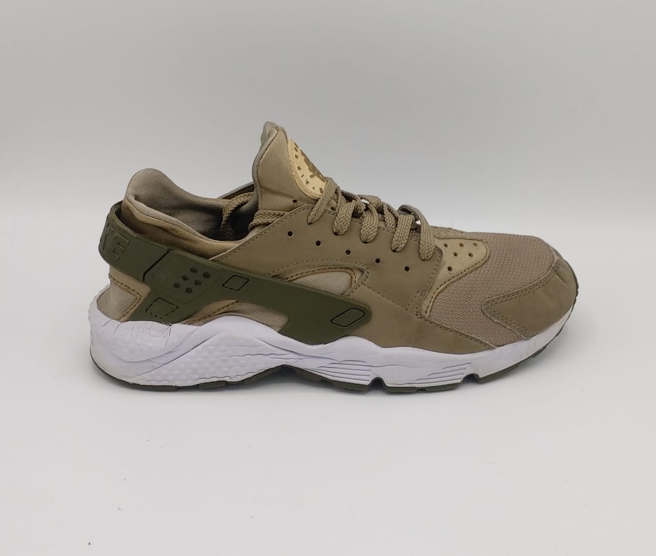 Nike Air Huarache Run sneakers, US 11 UK 10, good condition cushioned casual footwear.