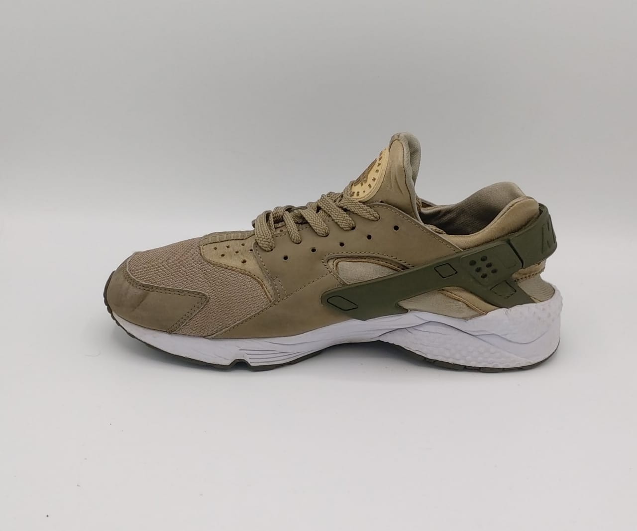 Nike Air Huarache Run sneakers, US 11 UK 10, good condition cushioned casual footwear.