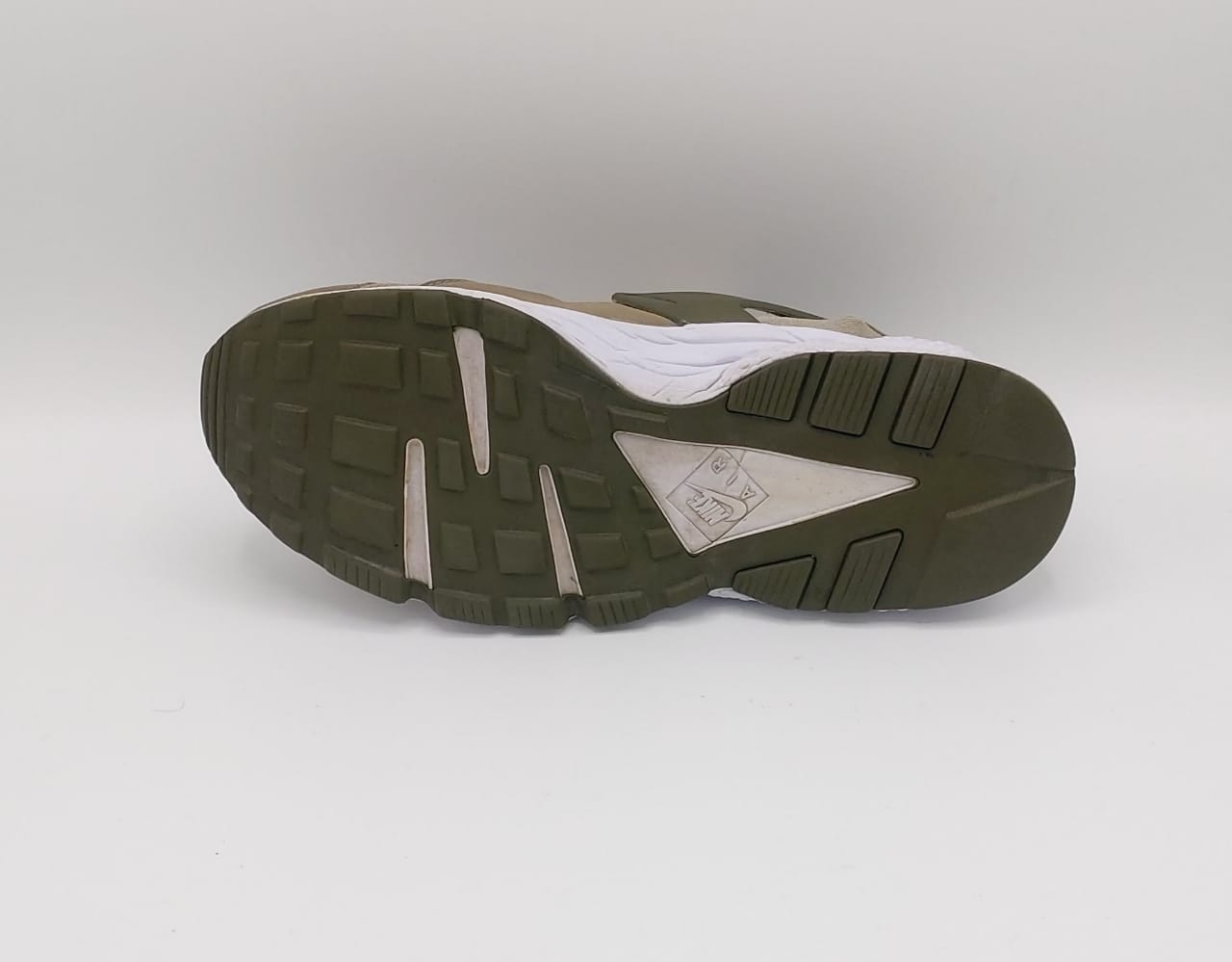 Nike Air Huarache Run sneakers, US 11 UK 10, good condition cushioned casual footwear.