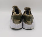 Nike Air Huarache Run sneakers, US 11 UK 10, good condition cushioned casual footwear.