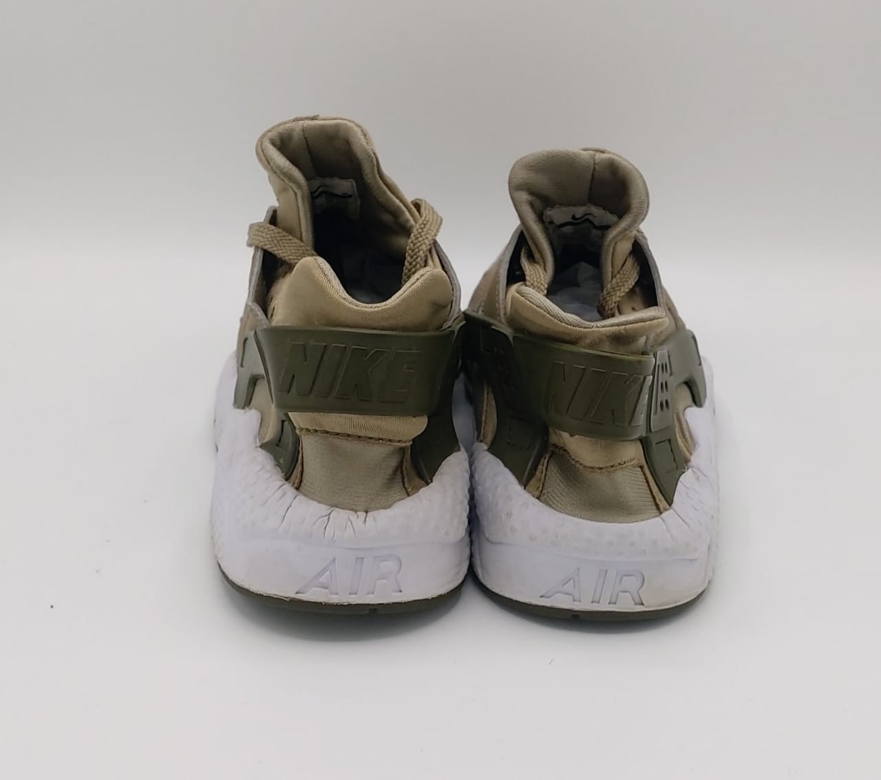 Nike Air Huarache Run sneakers, US 11 UK 10, good condition cushioned casual footwear.