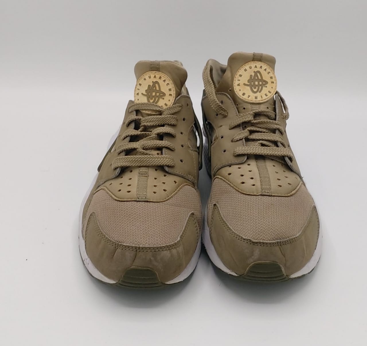 Nike Air Huarache Run sneakers, US 11 UK 10, good condition cushioned casual footwear.