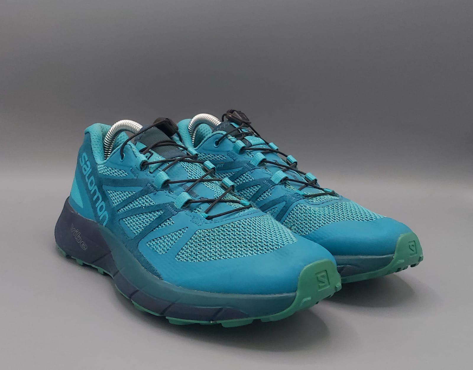Salomon Sense Ride trail shoes, US 7 UK 5.5 EUR 38.5, good condition cushioned outdoor footwear.