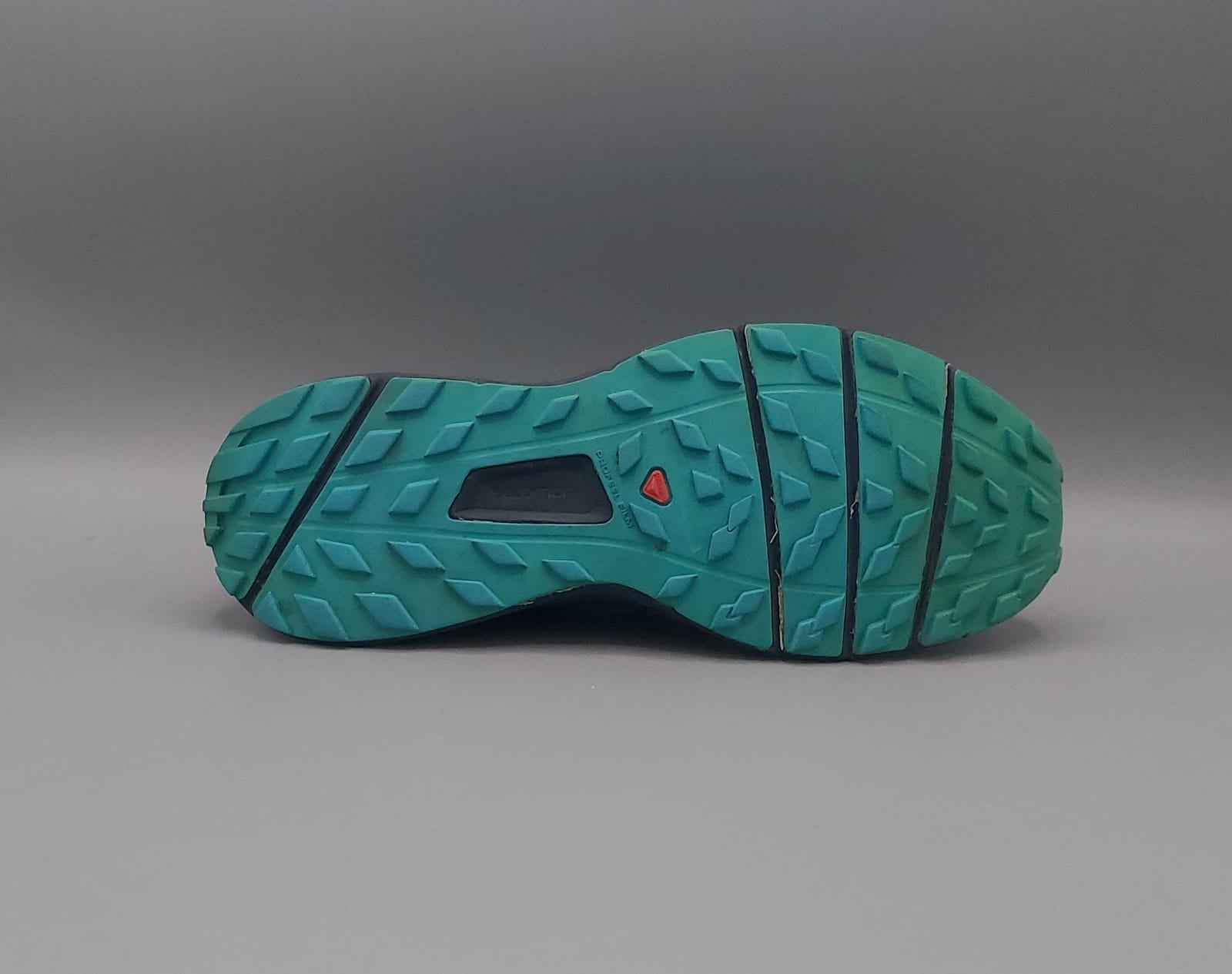 Salomon Sense Ride trail shoes, US 7 UK 5.5 EUR 38.5, good condition cushioned outdoor footwear.