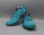 Salomon Sense Ride trail shoes, US 7 UK 5.5 EUR 38.5, good condition cushioned outdoor footwear.