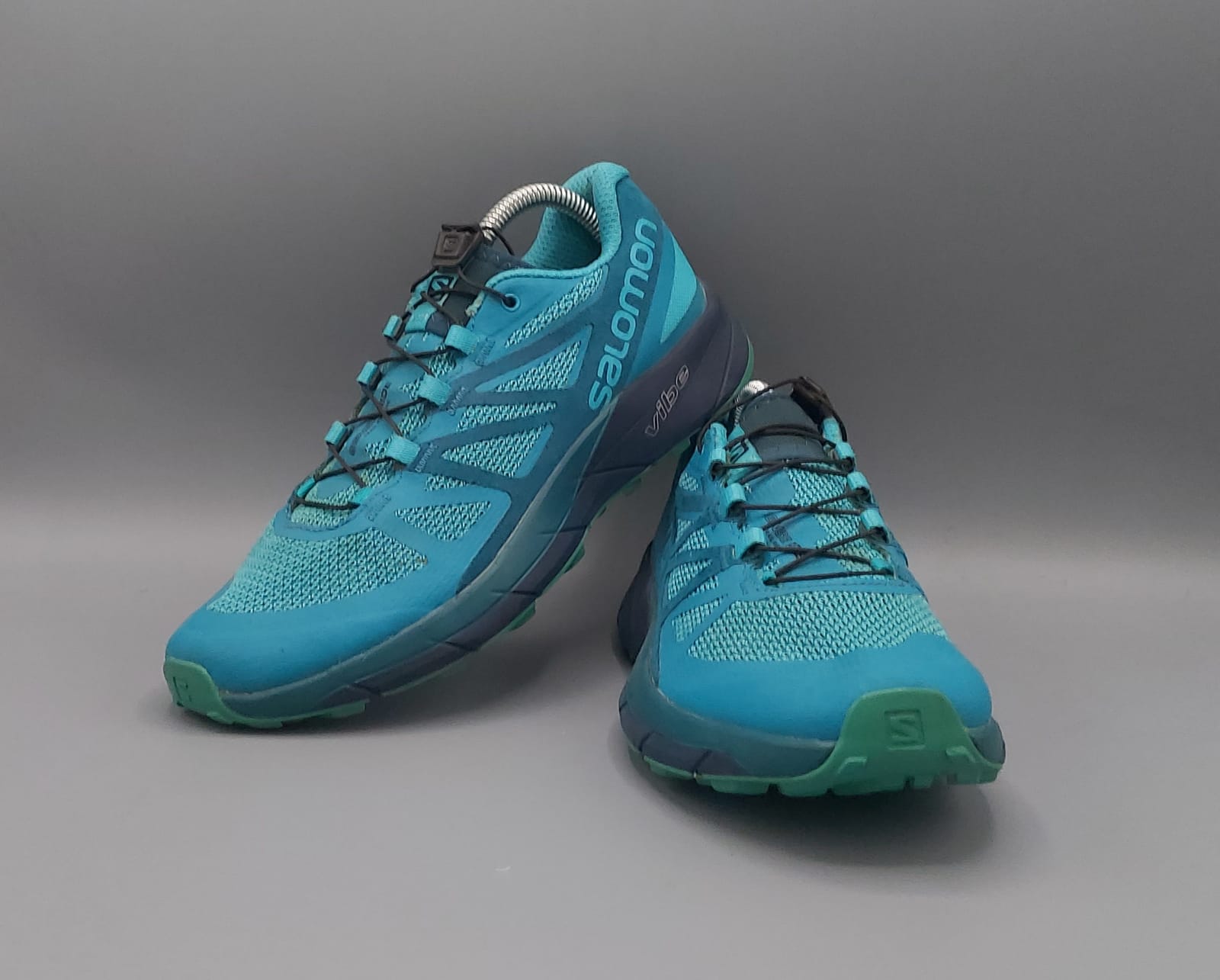 Salomon Sense Ride trail shoes, US 7 UK 5.5 EUR 38.5, good condition cushioned outdoor footwear.